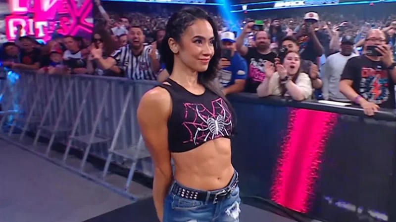 Triple H Posts Footage Of AJ Lee Signing New WWE Contract Before SmackDown&nbsp;Return
