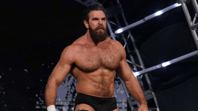 Jake Doyle Suffers Apparent Biceps Injury During AEW Tag Title Match on&nbsp;Dynamite